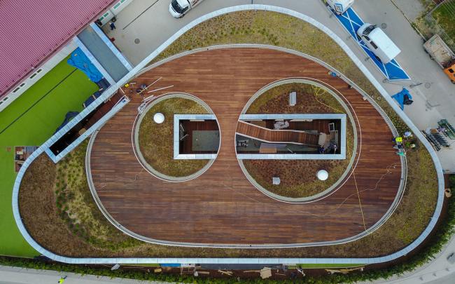 BIM建筑|混凝土与木板组成的弧形乐土:波兰幼儿园 BIM建筑|混凝土与木板组成的弧形乐土:波兰幼儿园